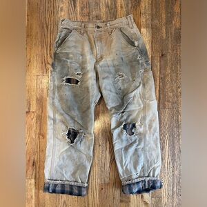 Vintage naturally worn and faded Carhartt pants